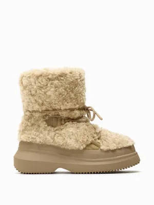 Flat faux shearling ankle boots